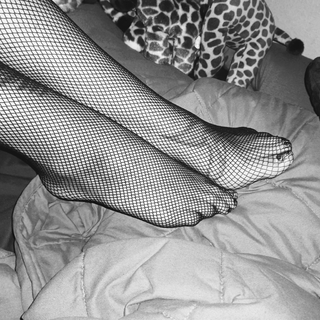 My pretty feet do a fishnet strip tease photo gallery by Princess Enby