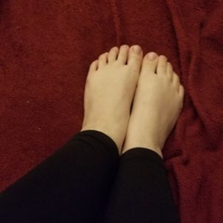 bare feet on soft red blanket photo gallery by Fairy Feet
